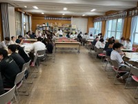 実地研修について教職員が討議する様子